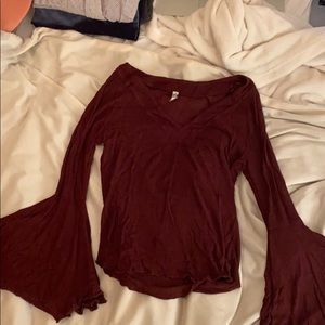 FREE PEOPLE shirt with flowy sleeves.